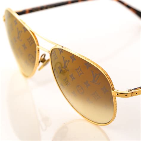 louis vuitton gold glasses.